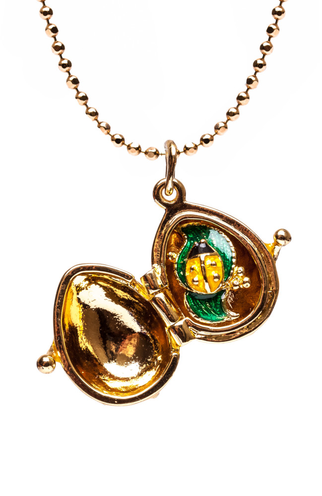 Tree Opening Yellow Egg Pendant