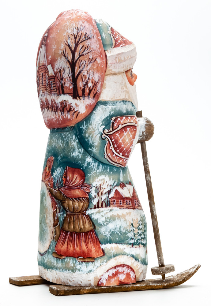 190 mm Skiing Santa with a Bag with hand painted Girl with Sleighs Wooden Carved Statue (by Igor Carved Wooden Figures Studio)