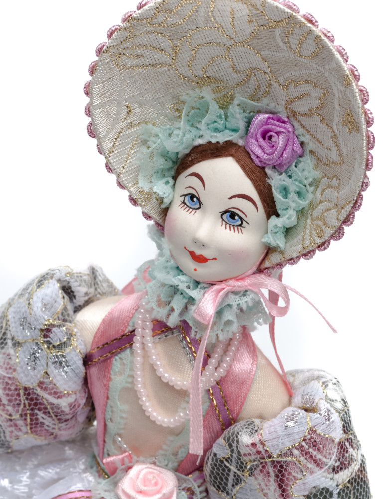 Girl in a Summer Dress and Hat Porcelain Doll on a Stand - 10 Inches