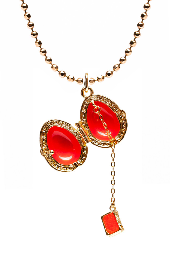 Cross Opening Pink Egg Pendant